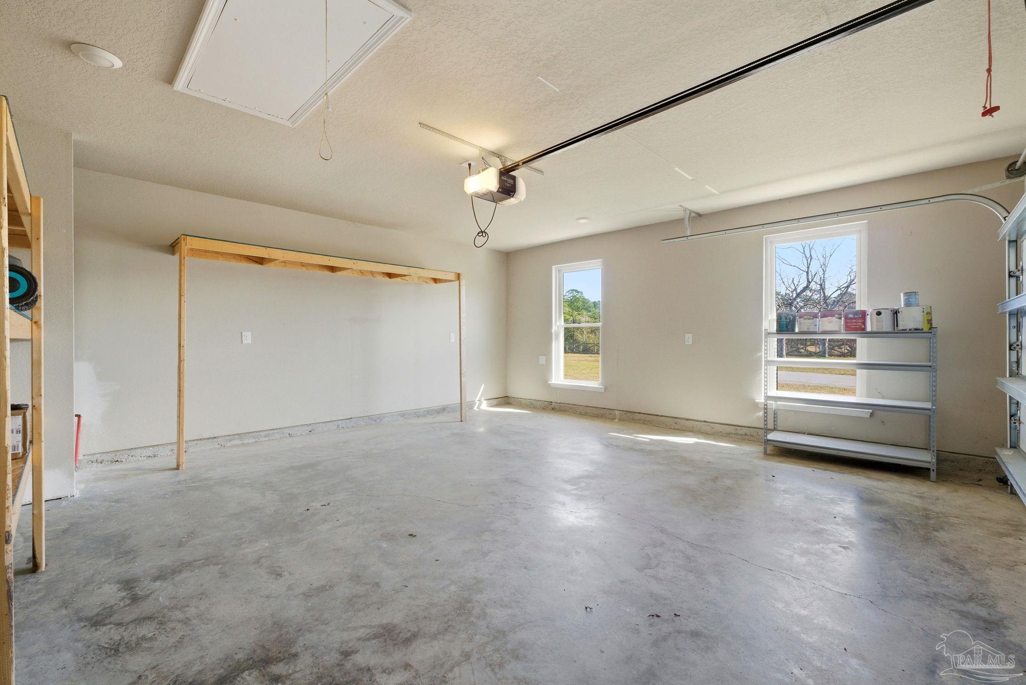 2033 Chavers Road Cantonment, FL 32533 - Photo 25 of 42 an empty room with windows and closet