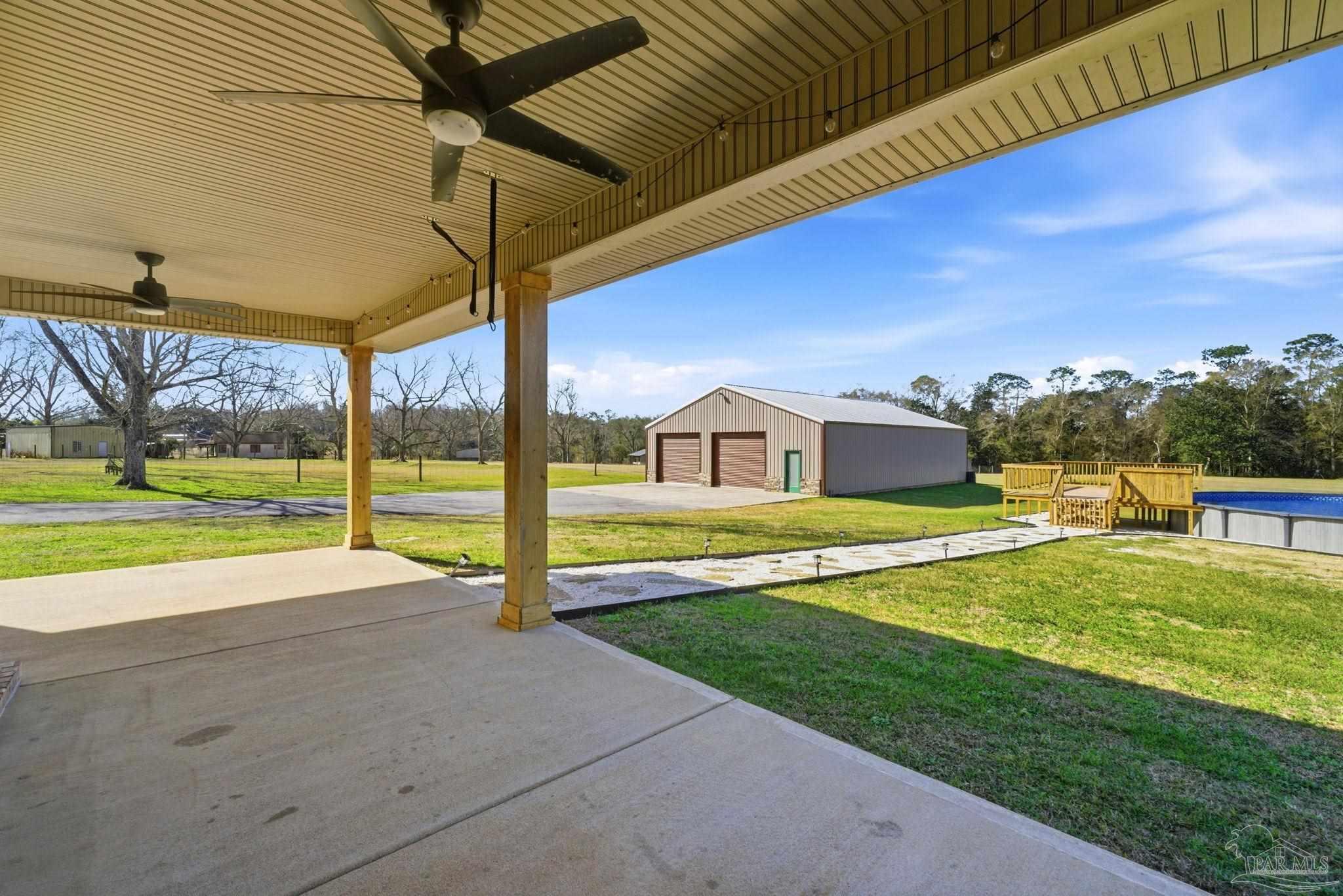 2033 Chavers Road Cantonment, FL 32533 - Photo 28 of 42 a house view with a outdoor space