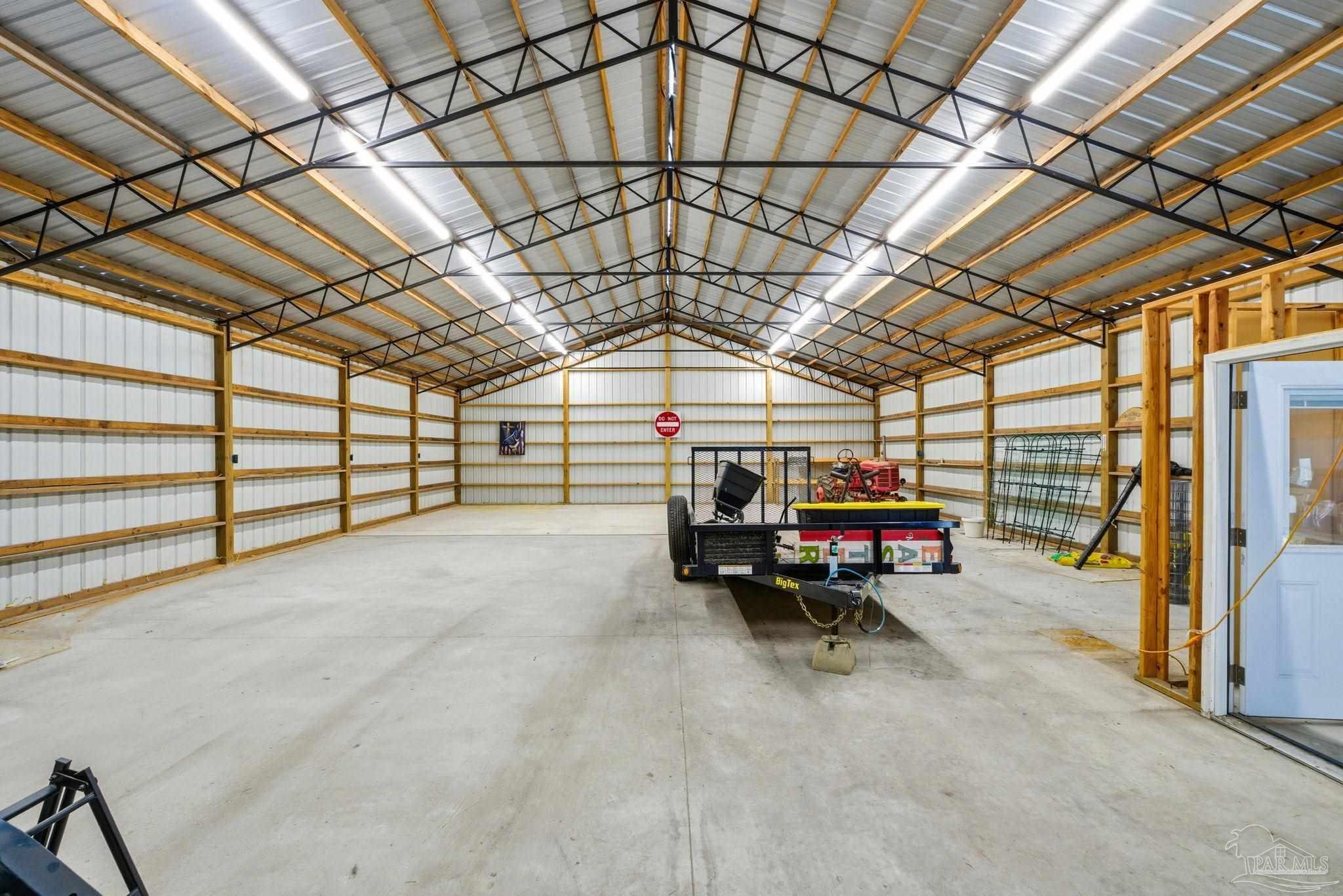 2033 Chavers Road Cantonment, FL 32533 - Photo 36 of 42 a view of parking garage with cars