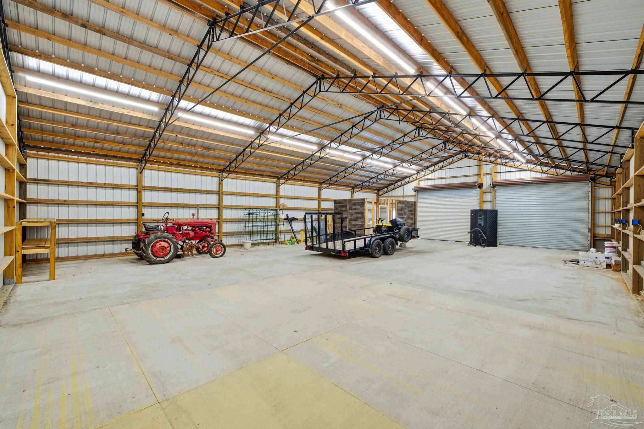 2033 Chavers Road Cantonment, FL 32533 - Photo 37 of 42 a view of parking garage with cars