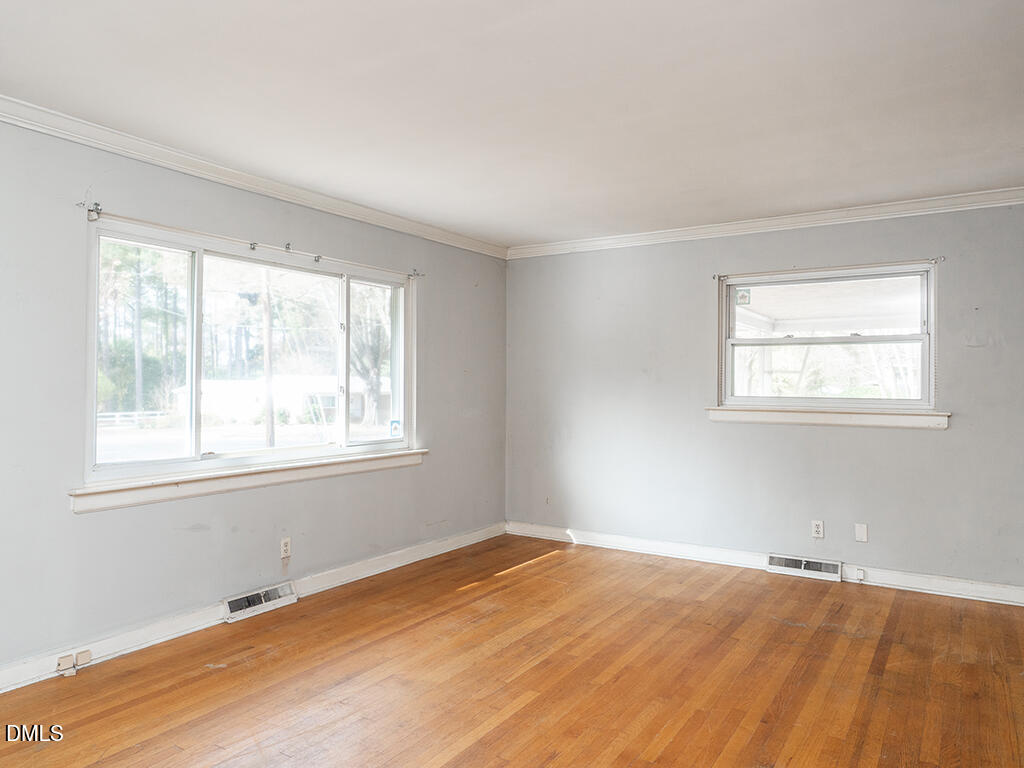 3114 Kenan Road Durham, NC 27704 - Photo 5 of 24 05 3114_KenanRd LivRm1_MLS