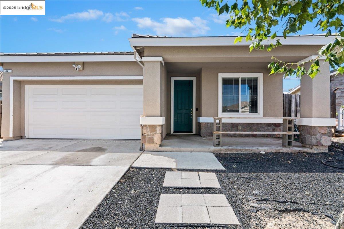 44 Vallarta Court Bay Point, CA 94565 - Photo 1 of 1 a view of a brick house with a large windows
