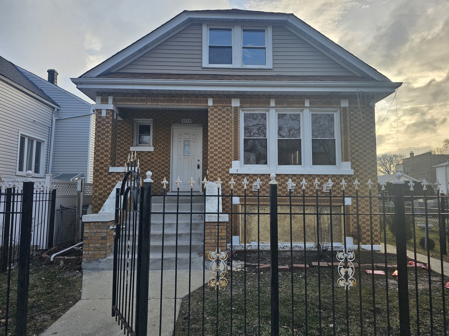 2715 North Monitor Avenue Chicago, IL 60639 - Photo 1 of 23 a view of a brick house with large windows