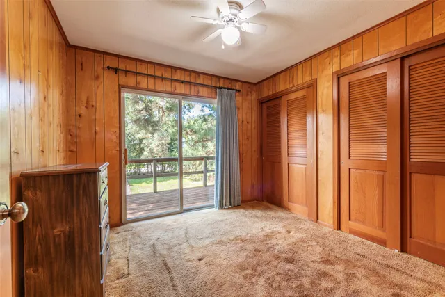 a view of a room with a large window