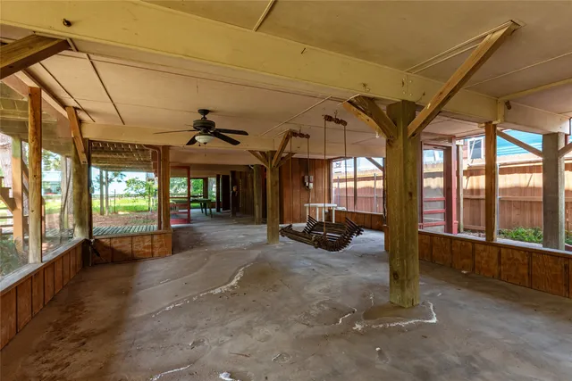 a view of a porch with furniture and a porch
