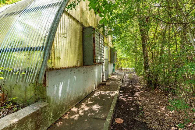 a view of a back yard from a patio