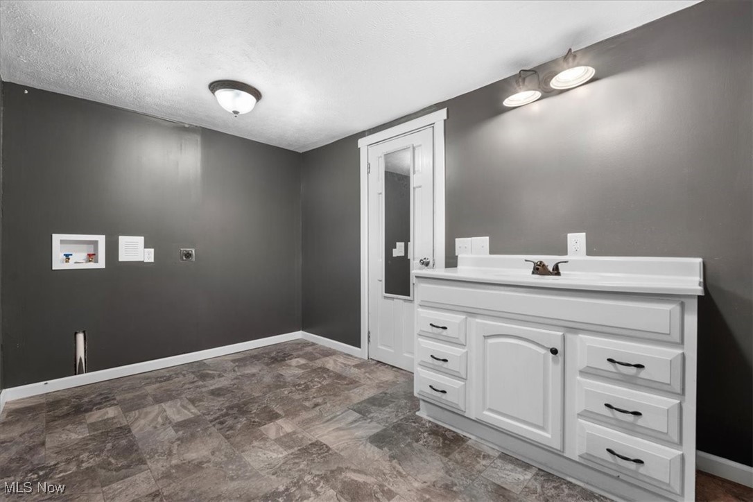 3006 North Cincinnati Ridge Road Coolville, OH 45723 - Photo 20 of 40 half bath with washer/dryer hook-up
