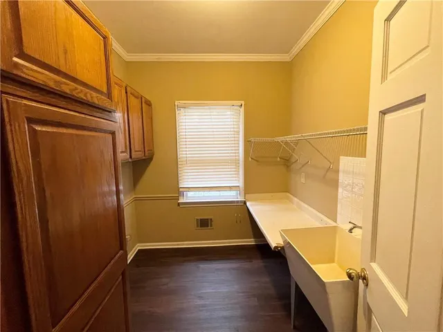 a bathroom with a tub and shower