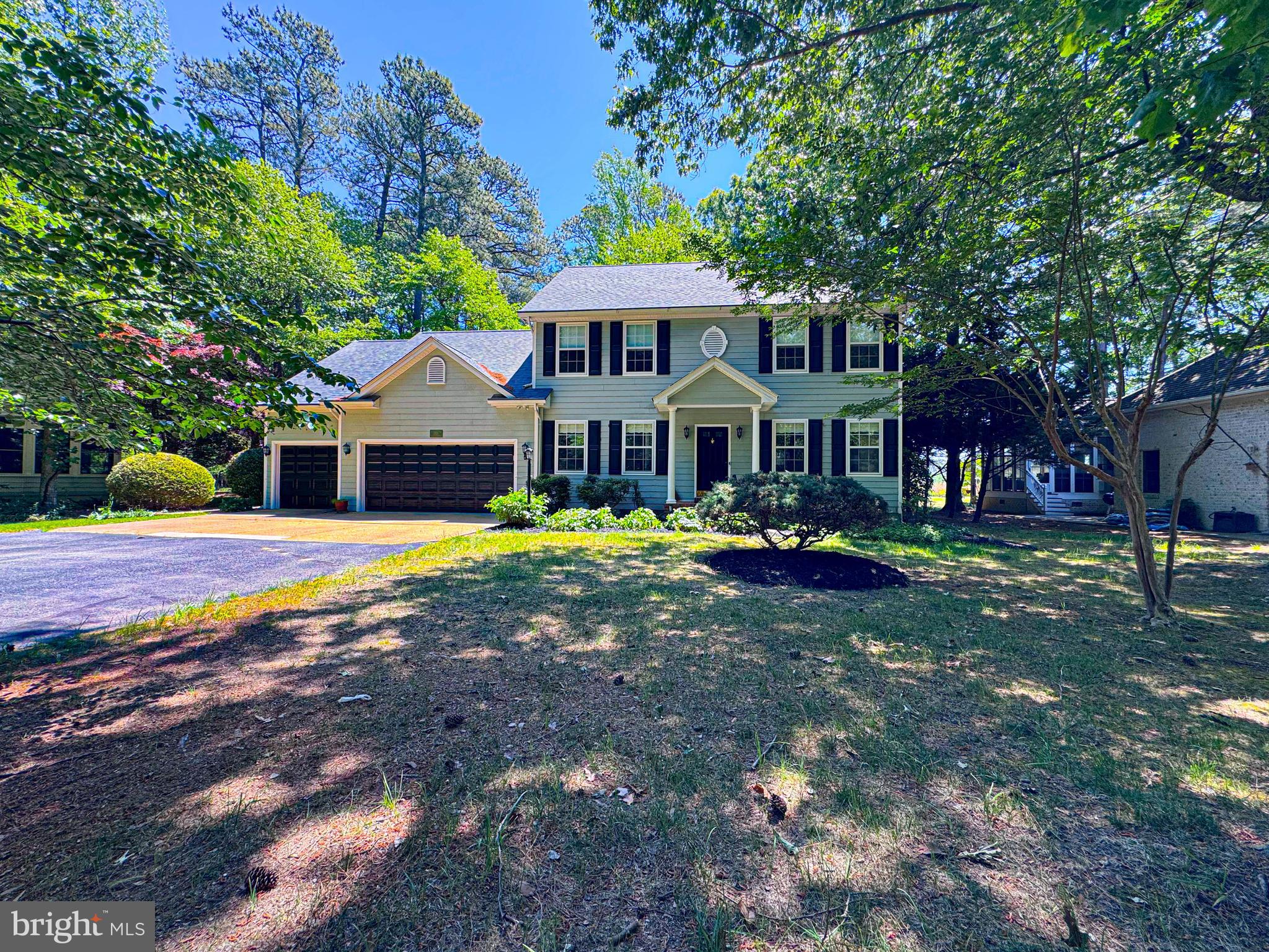 11325 Ingels Court Swan Point, MD 20645 - Photo 12 of 118 a view of a house with swimming pool and a yard
