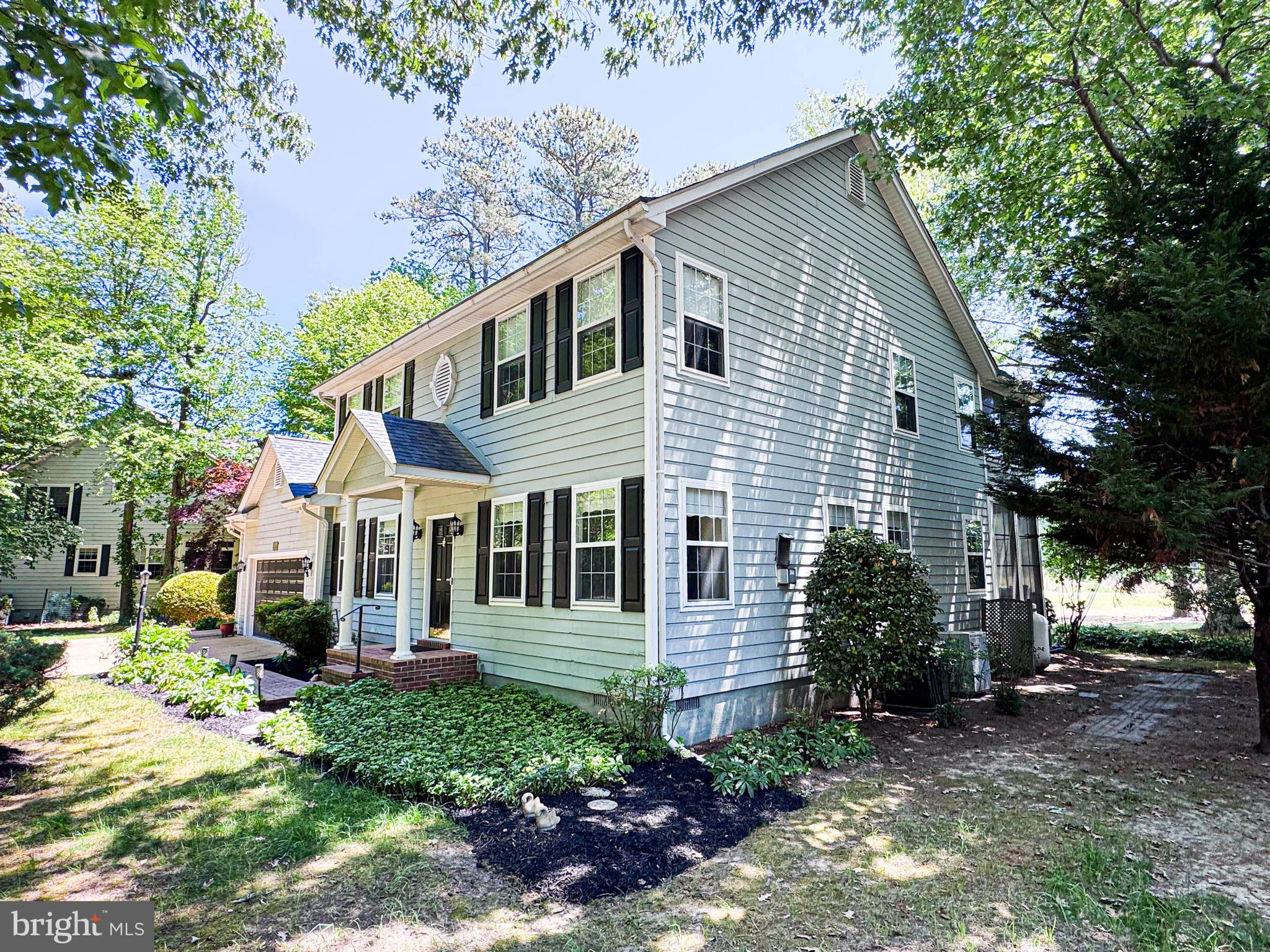 11325 Ingels Court Swan Point, MD 20645 - Photo 2 of 118 a view of a house with a yard