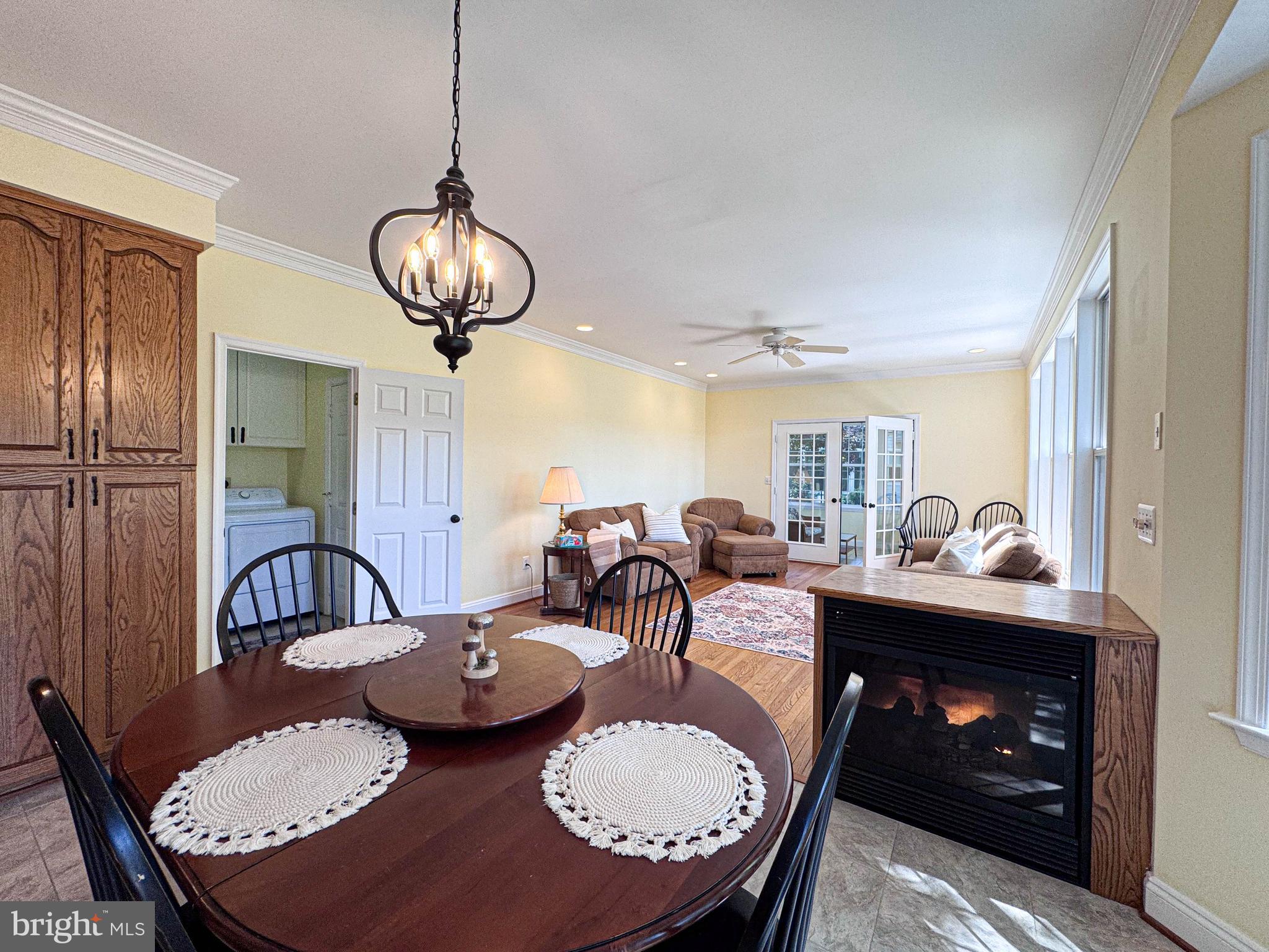 11325 Ingels Court Swan Point, MD 20645 - Photo 31 of 118 a view of a dining room with furniture window and wooden floor