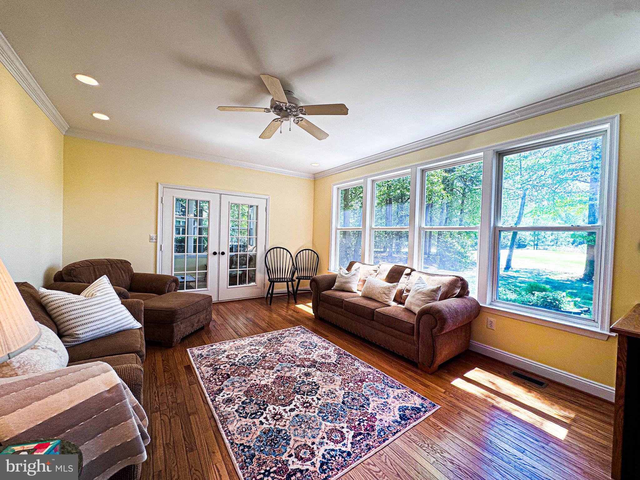 11325 Ingels Court Swan Point, MD 20645 - Photo 33 of 118 a living room with furniture and a large window