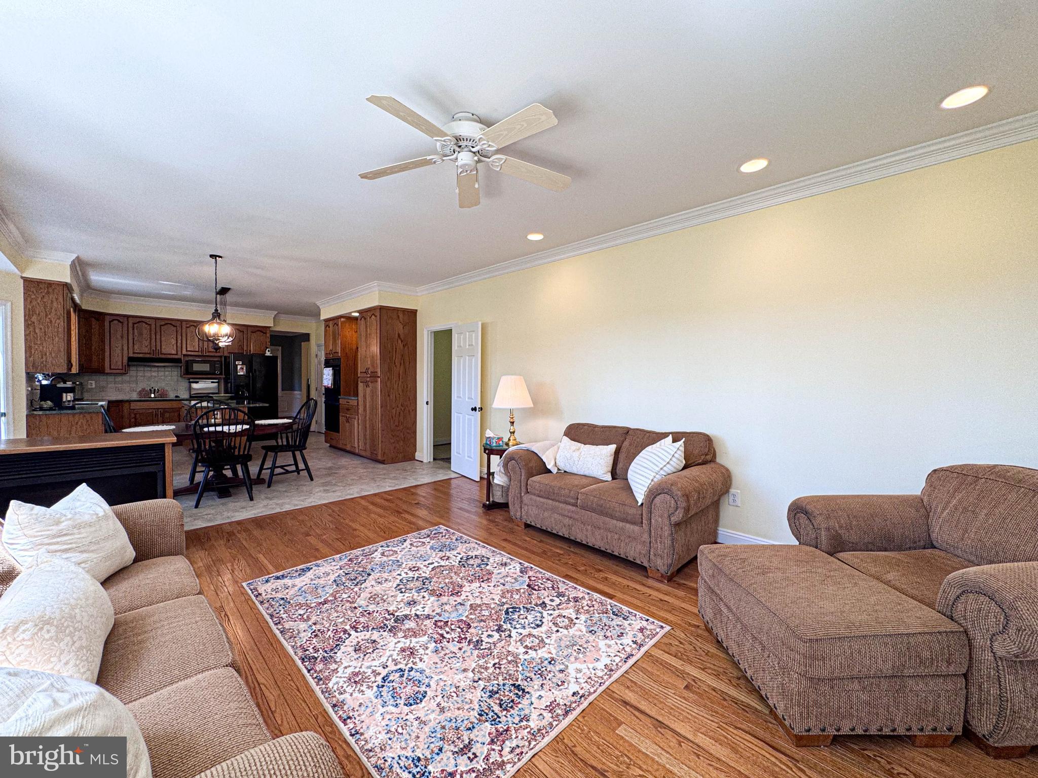 11325 Ingels Court Swan Point, MD 20645 - Photo 36 of 118 a living room with furniture and wooden floor
