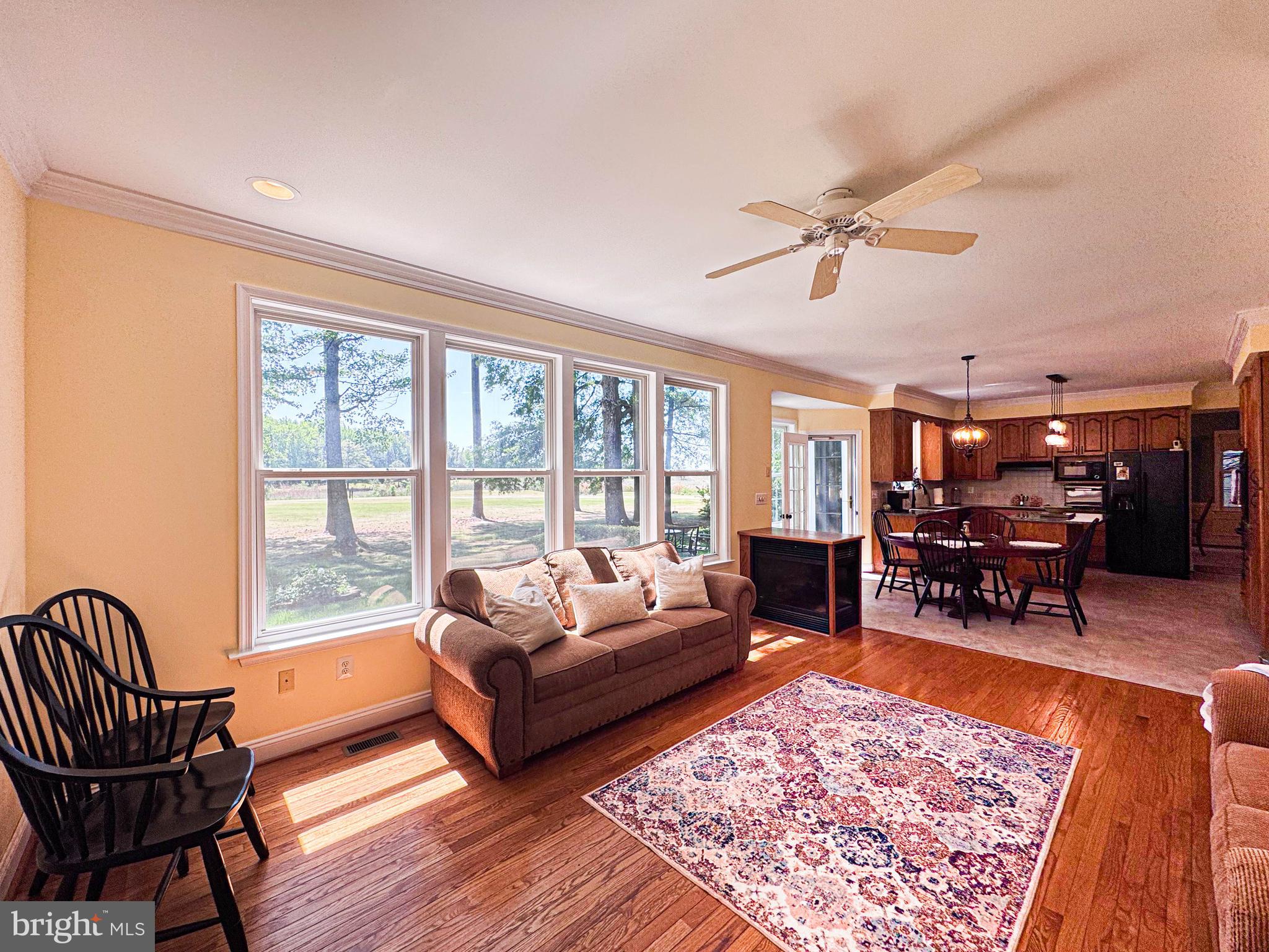 11325 Ingels Court Swan Point, MD 20645 - Photo 37 of 118 a living room with furniture and a large window