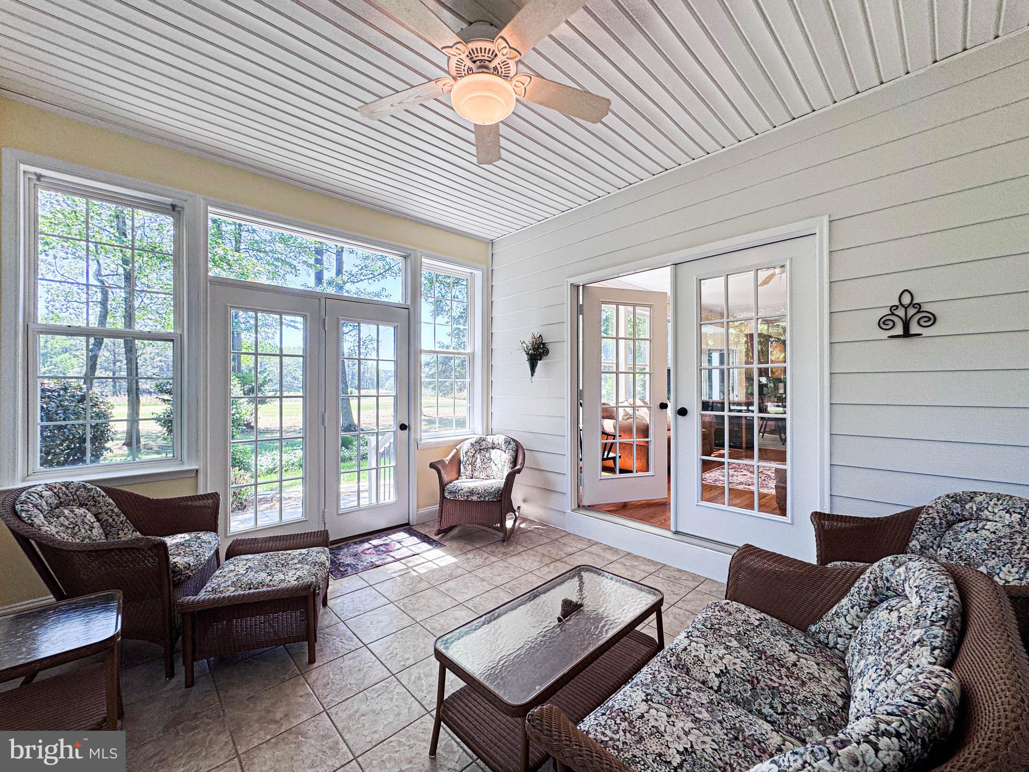 11325 Ingels Court Swan Point, MD 20645 - Photo 39 of 118 a living room with furniture and a large window