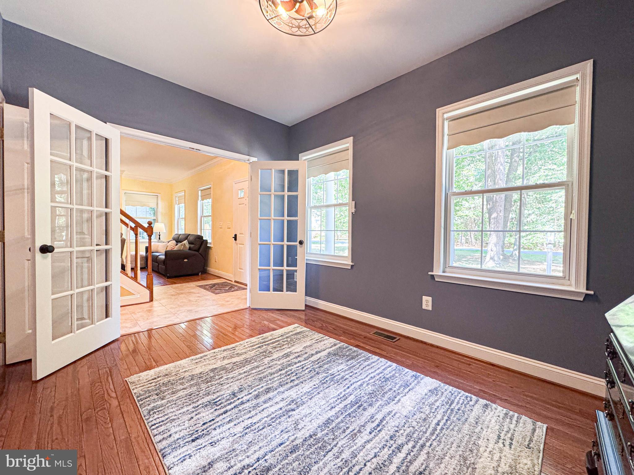 11325 Ingels Court Swan Point, MD 20645 - Photo 48 of 118 a view of a livingroom with wooden floor and a rug