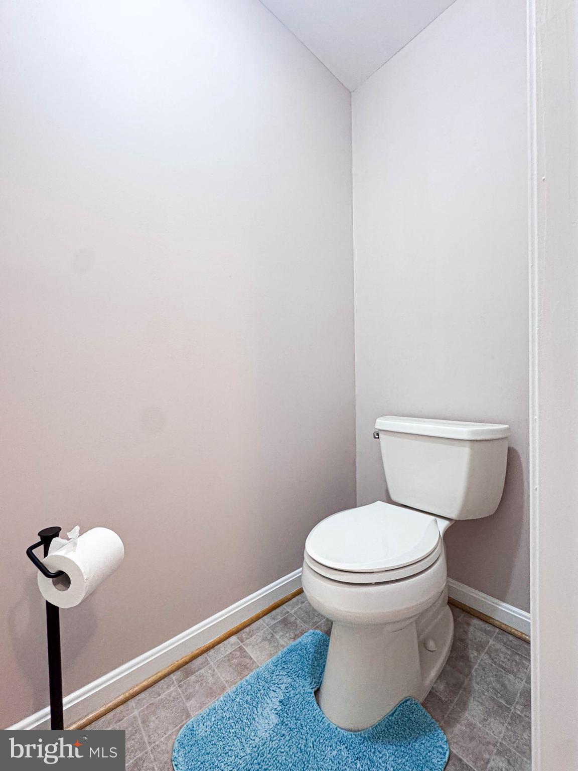 11325 Ingels Court Swan Point, MD 20645 - Photo 87 of 118 a bathroom with a toilet and a mirror