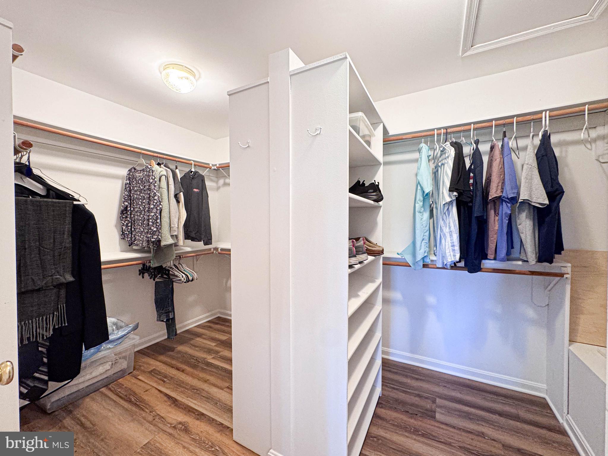 11325 Ingels Court Swan Point, MD 20645 - Photo 92 of 118 a view of walk in closet with clothes and shoes