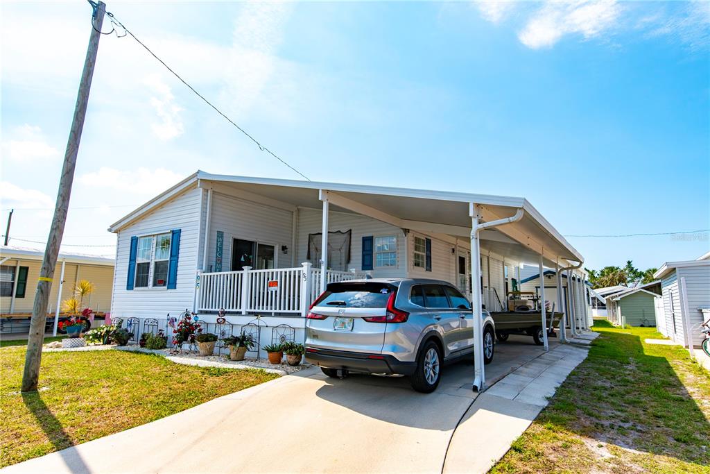 10101 Burnt Store Road, Unit 95 Punta Gorda, FL 33950 - Photo 1 of 1 95 Dogwood Front