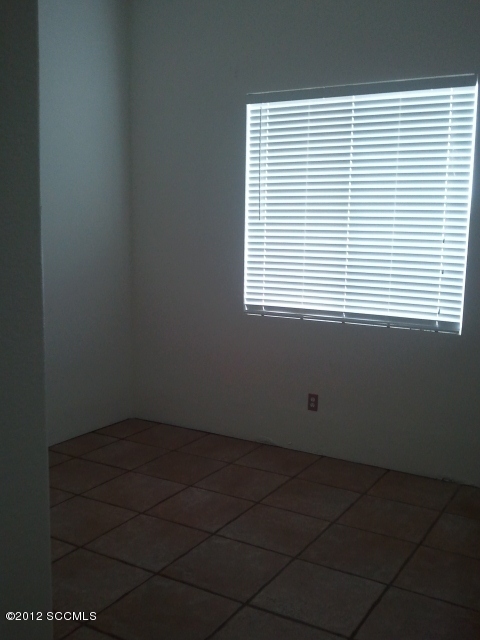 92 Back Nine Terrace Rio Rico, AZ 85648 - Photo 6 of 10 an empty room with a window