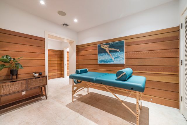 a room with furniture and wooden floor