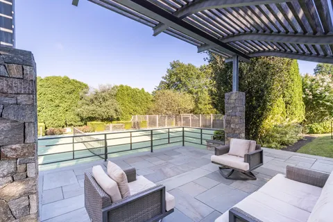 a view of a house with a street