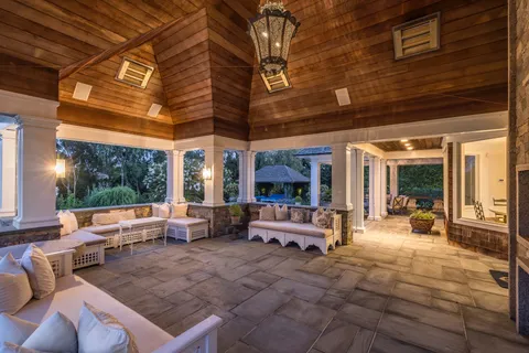 a view of living room filled with furniture