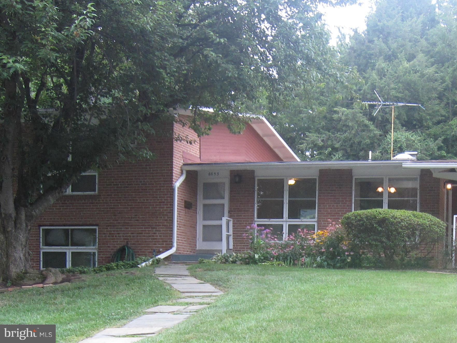 Front entry accessed from walkway or carport