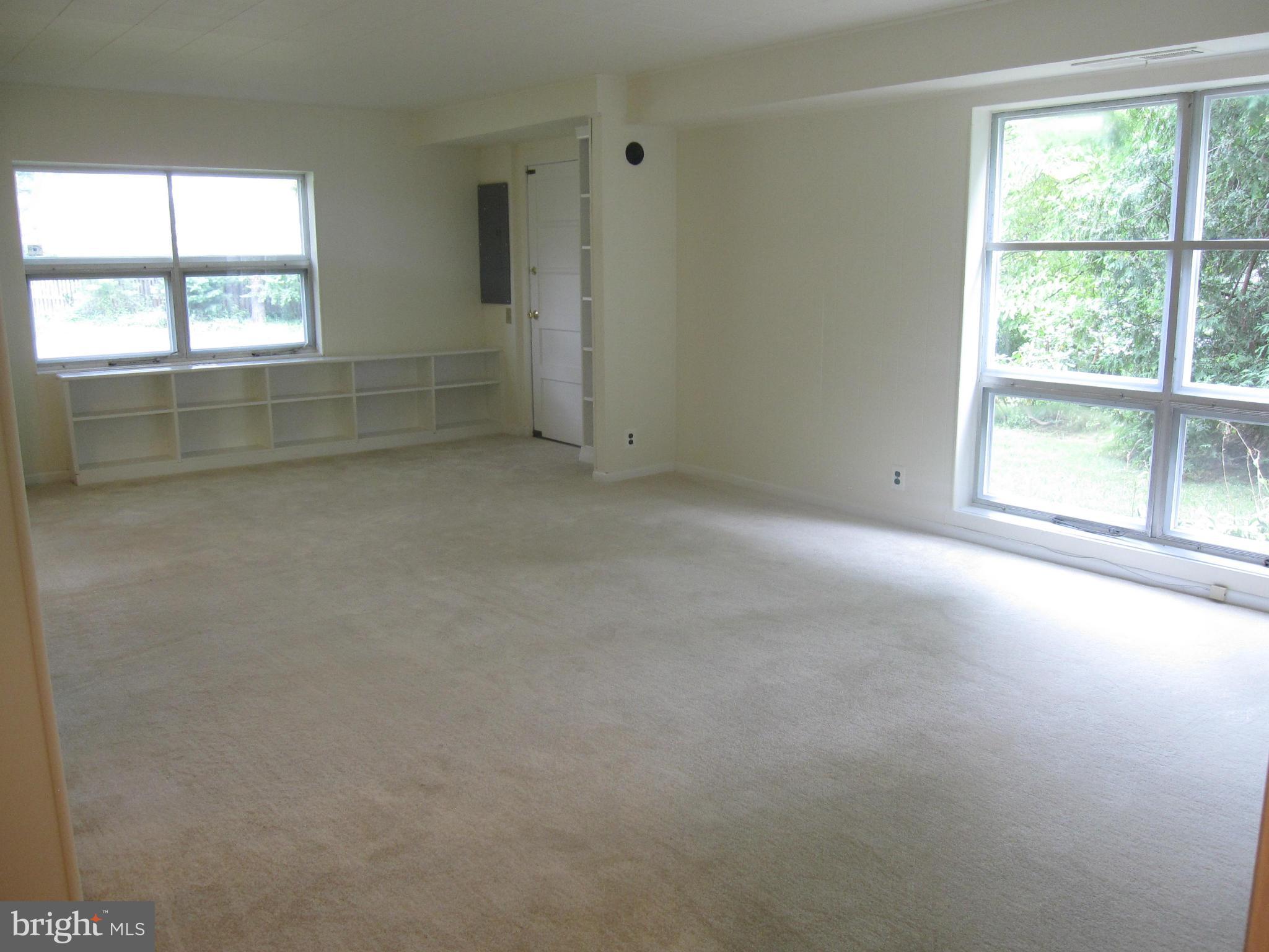 6653 Old Chesterbrook Road McLean, VA 22101 - Photo 21 of 30 Carpeted Family Room with exterior door