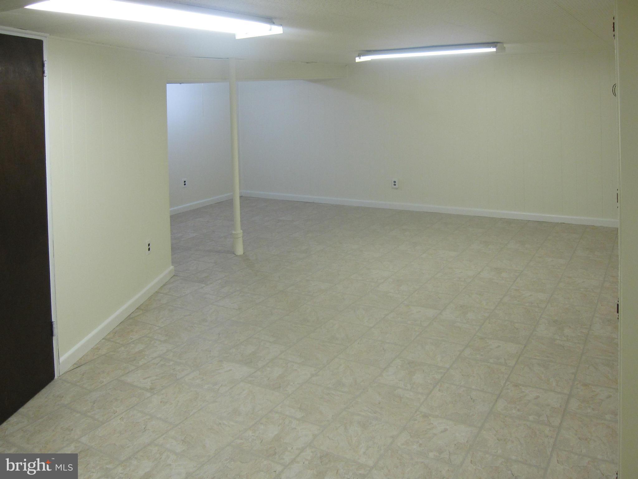 6653 Old Chesterbrook Road McLean, VA 22101 - Photo 24 of 30 Large Recreation Room with new flooring