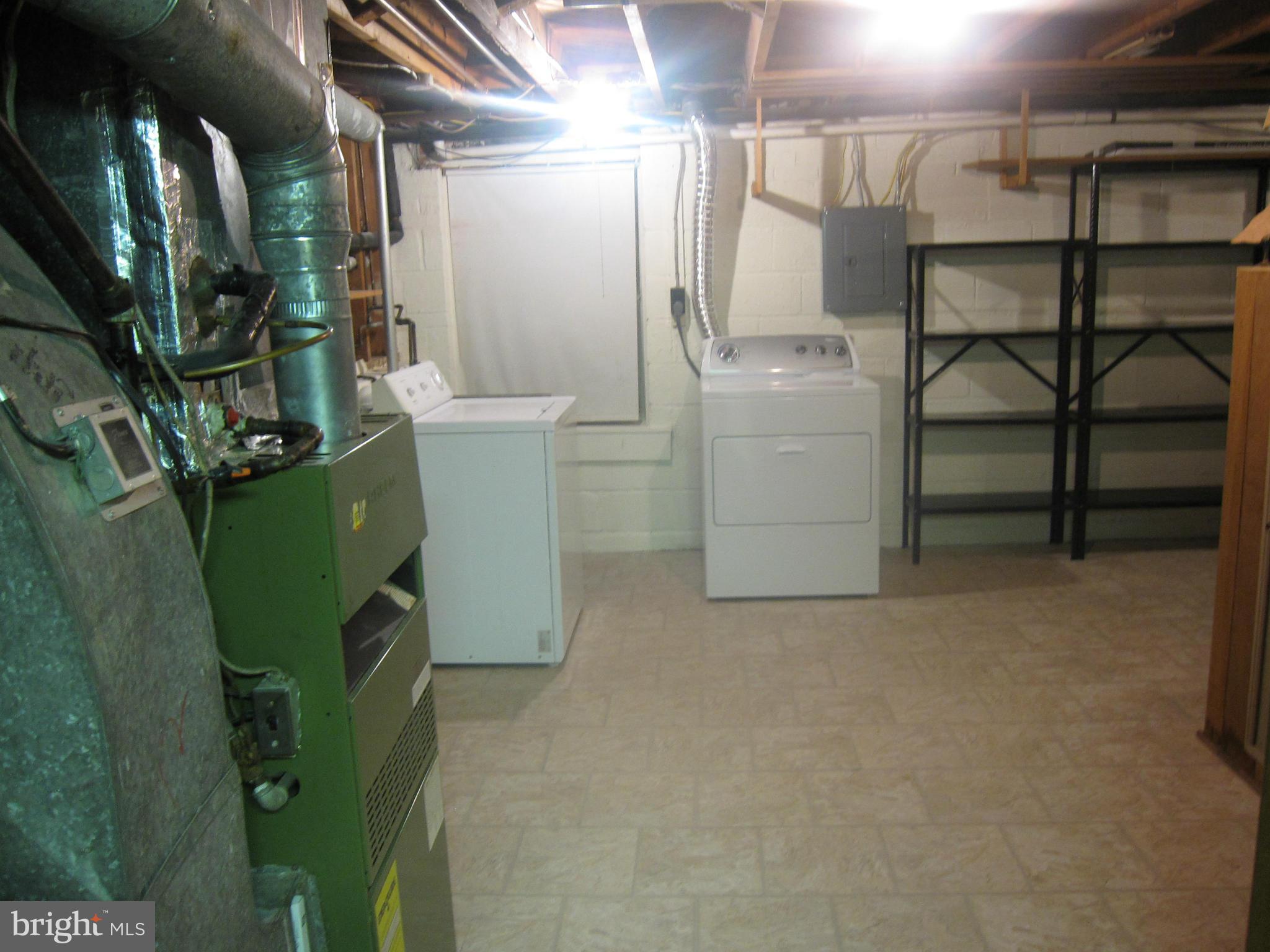 6653 Old Chesterbrook Road McLean, VA 22101 - Photo 26 of 30 Laundry Room with storage space and small shop