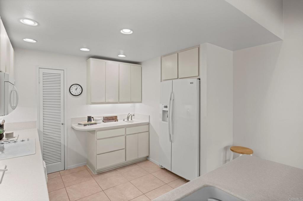 1876 Haymarket Road Encinitas, CA 92024 - Photo 12 of 43 a bathroom with a double vanity sink a mirror and a shower