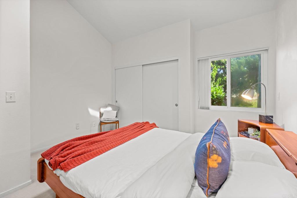 1876 Haymarket Road Encinitas, CA 92024 - Photo 17 of 43 a bedroom with bed and a window
