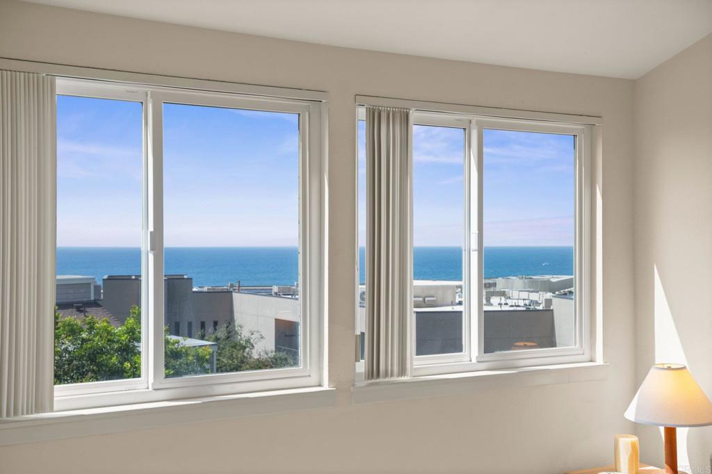1876 Haymarket Road Encinitas, CA 92024 - Photo 22 of 43 a view of a room that has a window and wooden floor