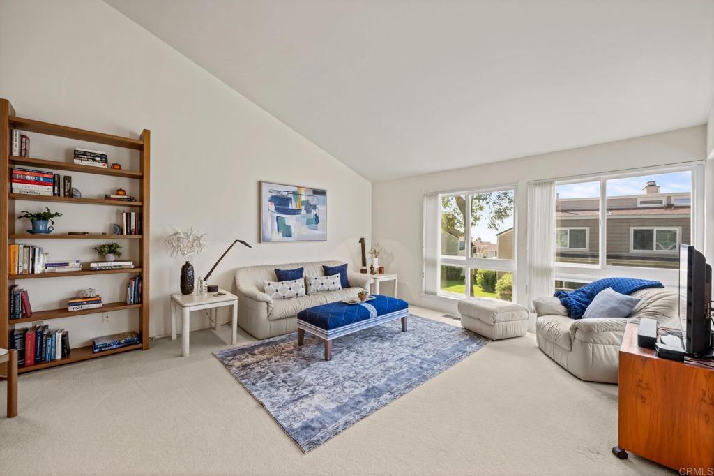 1876 Haymarket Road Encinitas, CA 92024 - Photo 6 of 43 a living room with furniture and a large window