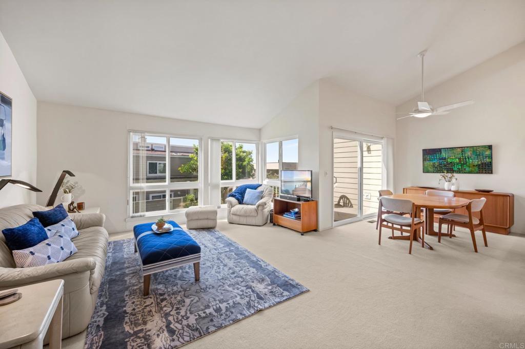 1876 Haymarket Road Encinitas, CA 92024 - Photo 7 of 43 a living room with furniture and large windows