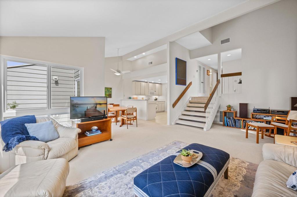 1876 Haymarket Road Encinitas, CA 92024 - Photo 8 of 43 a living room with furniture and wooden floor