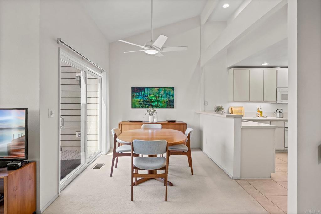 1876 Haymarket Road Encinitas, CA 92024 - Photo 9 of 43 a view of a dining room with furniture and a window