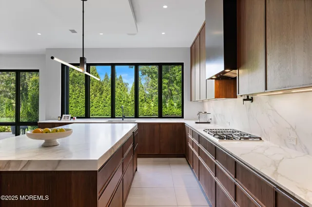 a view of an empty room with glass door
