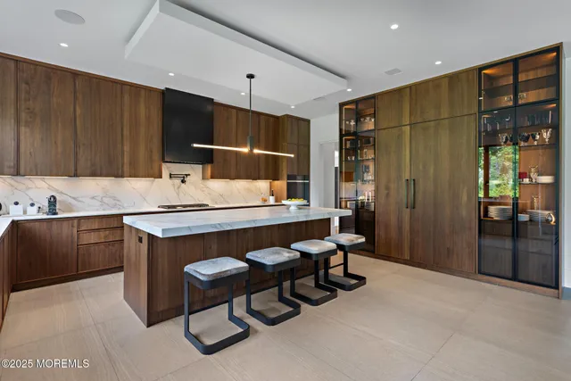 a bed room with a bed and a large window