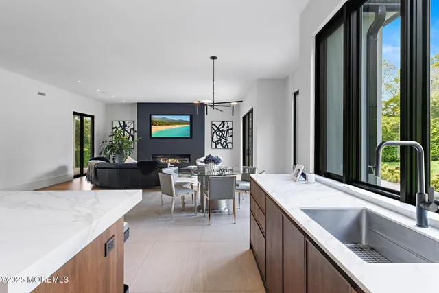 a bedroom with a bed and a chair