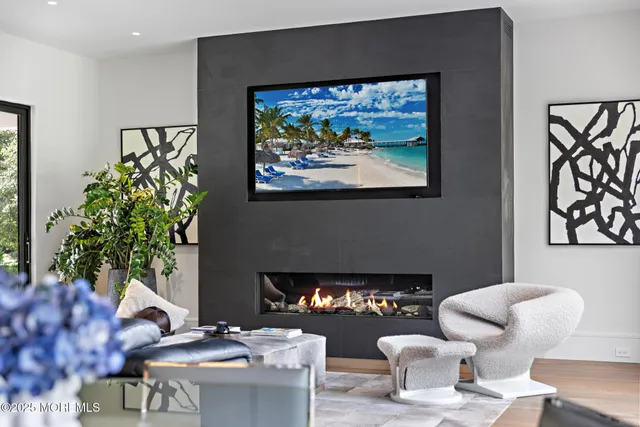 a bedroom with a large bed and a large window