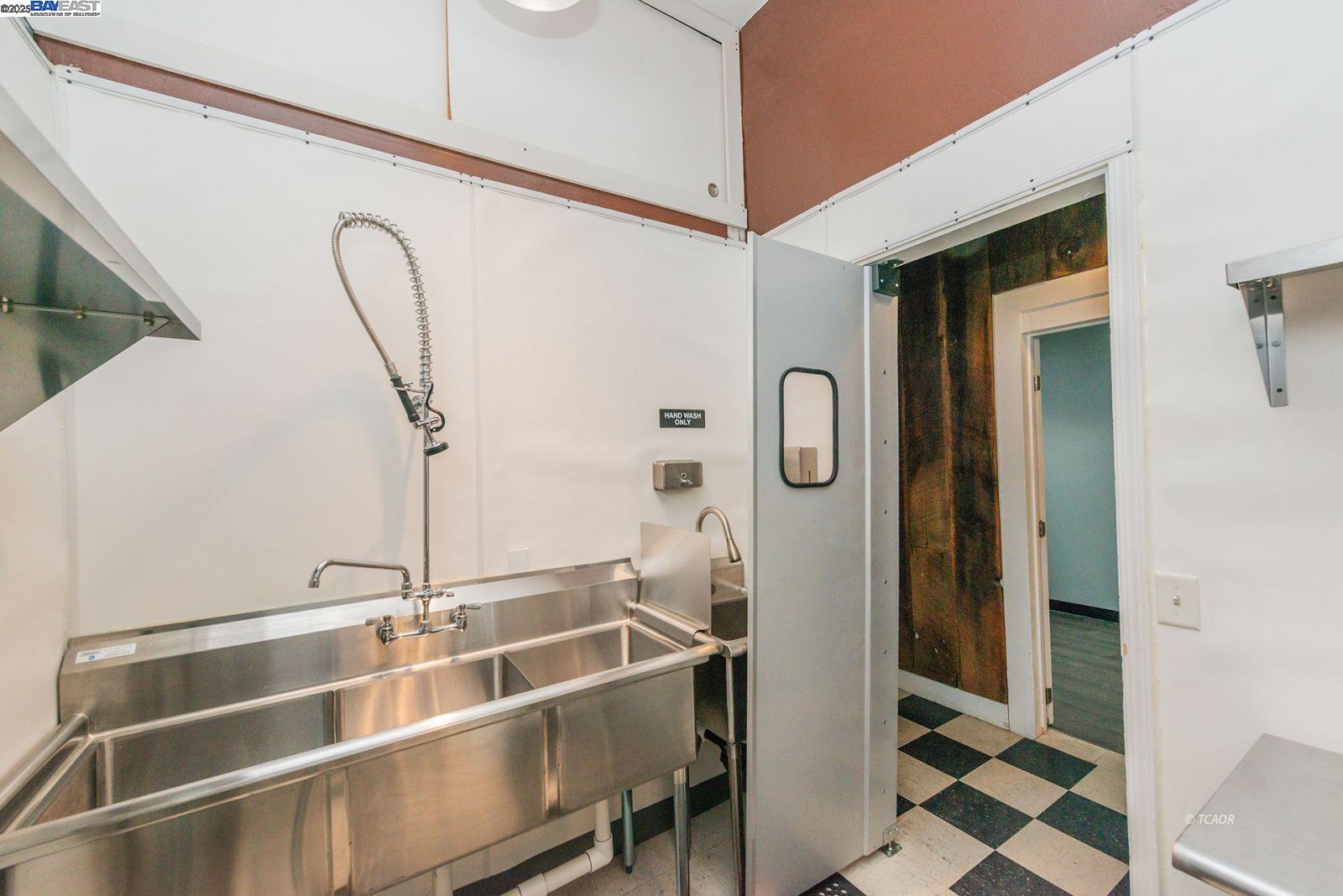 515 Main Street Weaverville, CA 96093 - Photo 18 of 36 a bathroom with a double vanity sink a mirror and a shower