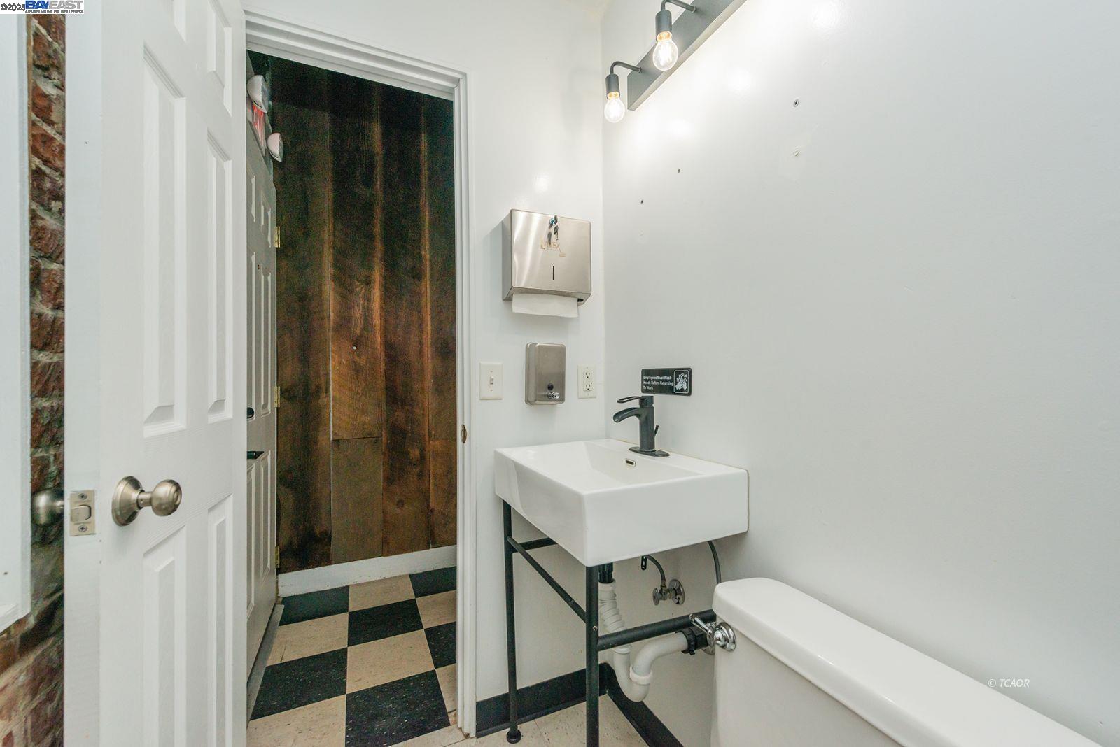 515 Main Street Weaverville, CA 96093 - Photo 20 of 36 a bathroom with a sink a toilet and shower