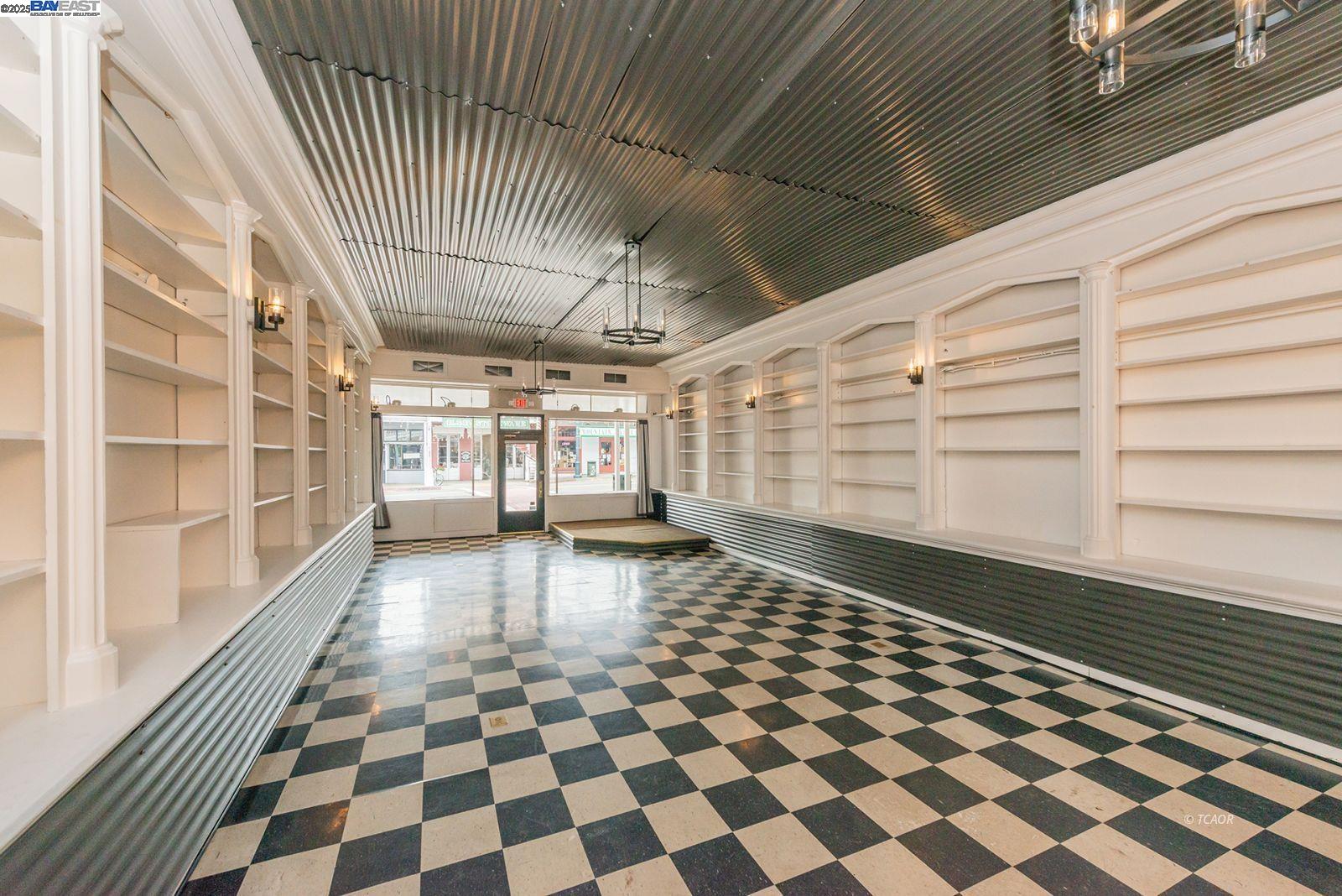 515 Main Street Weaverville, CA 96093 - Photo 6 of 36 a hallway with a black white checkered floor