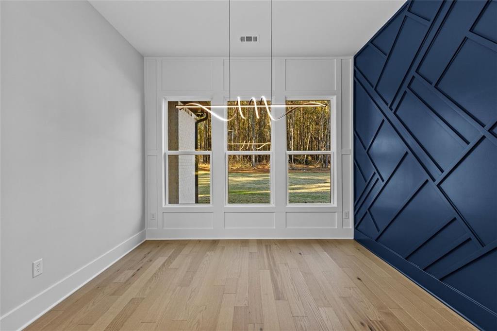 1198 Peters Cemetary Road Monroe, GA 30655 - Photo 18 of 64 a view of an empty room with a window