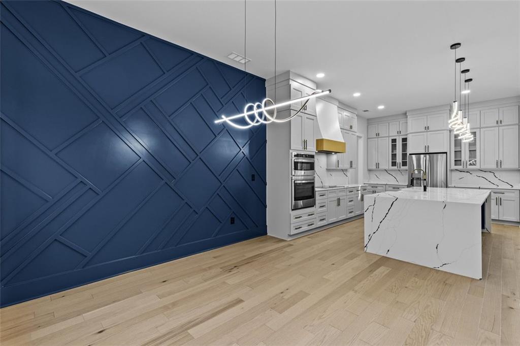 1198 Peters Cemetary Road Monroe, GA 30655 - Photo 20 of 64 a view of a livingroom with furniture and a ceiling fan