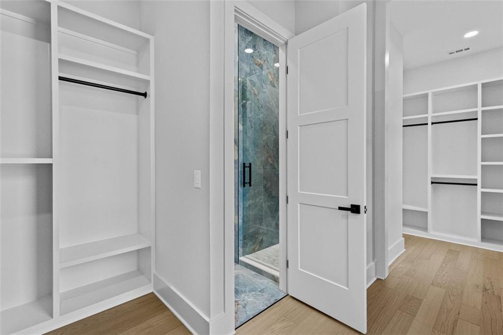 1198 Peters Cemetary Road Monroe, GA 30655 - Photo 30 of 64 a view of walk in closet with empty racks