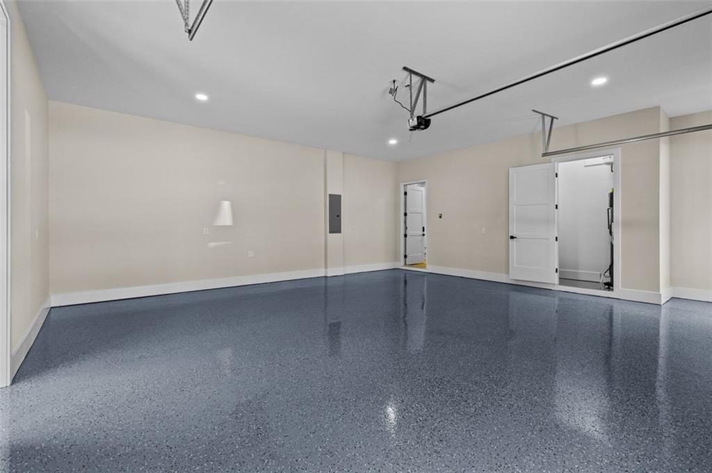 1198 Peters Cemetary Road Monroe, GA 30655 - Photo 53 of 64 an empty room with wooden floor and windows