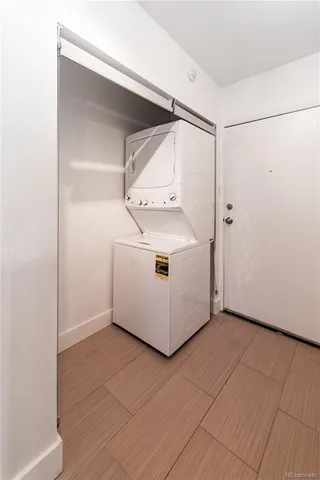a view of a balcony with wooden floor